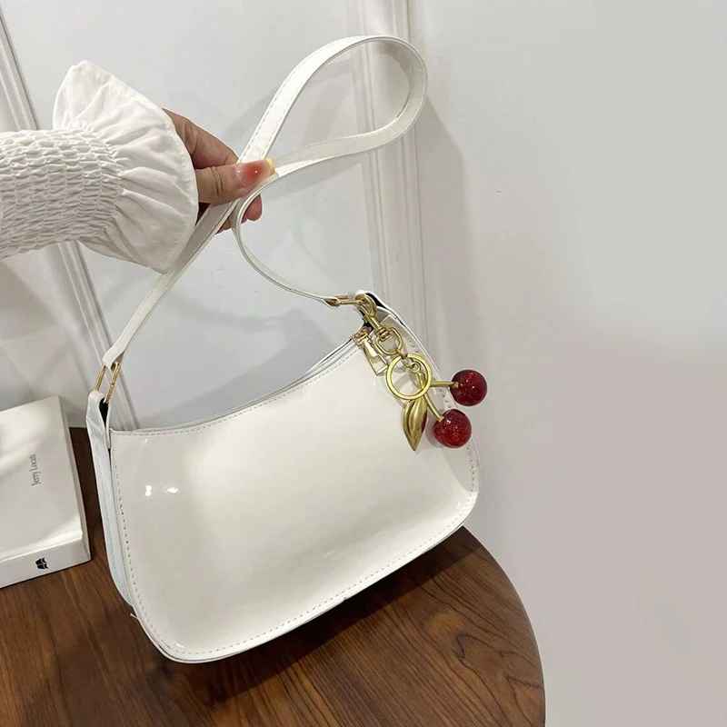 Women's PU Leather Handbag Versatile Fashion Solid Color Cherry Pendant Shoulder Bag Casual Commuting Bag Girl Underarm Bag